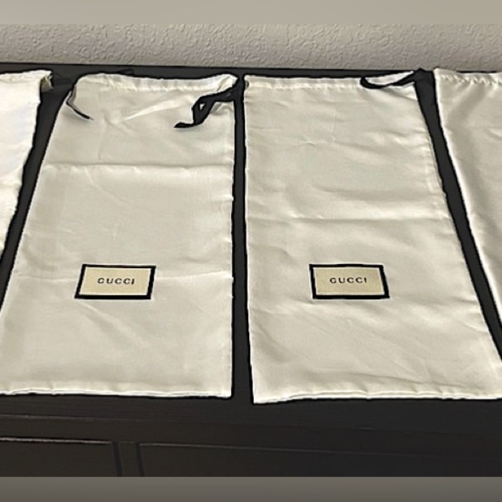 Gucci, authentic , never used, one pair of silky dust bags for sale!